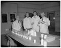 Milk judging for the 1952 contests held in connection with the annual Dairy Manufacturers Association, February 1952