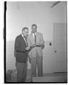 Joe Berry, OSC Foundation gives M. Robertson the first GE employee alumni donation check, June 1955