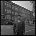 Gary Ford, a member of OSU's G.E. College Bowl team, posing outside of the Commerce Building