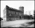 Armory Building, Salem. Street with streetlamps in foreground. Unidentified building on right.