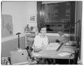 Virginia Taylor, staff artist in OSC Publications Office, July 1958