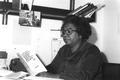 Woman with Urban League brochure