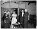 Mollie and August Strand conversing with Chancellor John Richards and Mrs. Richars at a president's reception, Memorial Union