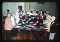 RSVP women with quilt, Oregon, 1975