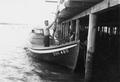 Loading gill nets into a boat in Ilwaco