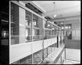 Wire-covered walls at rear of tellers' cages, US National Bank, Portland.