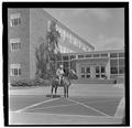 E. L. "Dad" Potter, Animal Husbandry professor, posing with a horse, May 1964