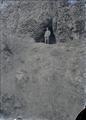 Benjamin A. Gifford standing at entrance to cave