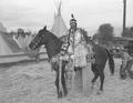 Native American woman on horse