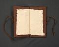 Sewing needle book of brown velvet backed with brown silk moire