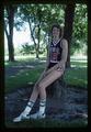 Carol Menken posing on lower campus in her Team USA jersey