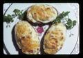 Closeup of twice baked potatoes on plate, 1975