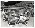 Students enjoying a sunny day on the Memorial Union club terrace