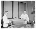 Dr. Robert Newburgh and Dr. Vernon Cheldelin doing research, 1956