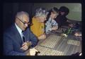 Mr. Forney and Edith Forney playing bingo at Mid Valley Coin Club meeting, Corvallis, Oregon, circa 1973