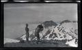 J. B. Flett and William Finley Jr. photographing Pyramid Peak