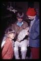 Posing with a beaded art class mask, Camp Arago, Oregon, July 1969