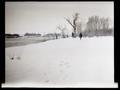 Men standing in snow