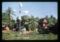 Farmhouse and windmill along Klong (canal), Thailand, circa 1970