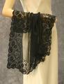Handkerchief of black chiffon with wide border of black floral lace