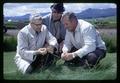 David Chilcote, Henry Rampton, and William Lee examining grass at Hyslop Farm, Corvallis, Oregon, circa 1965