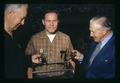 T. J. Starker, Andy Landforce, and Rex Hardley [?] examine crawfish, Polk County, Oregon, circa 1971