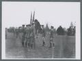 Commanding officer inspecting color guard, circa 1927