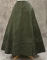 Skirt of blackish green silk gazar with applied bias bands above hem