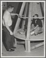 Mercury Project Capsule team members with their simulator