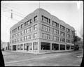 Covey Cadillac & Pierce showroom, in J. G. Edwards Building, Washington and 21st, Portland. Oregon Auto Exchange in background, street in foreground.