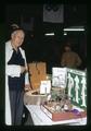 T. J. Starker at Oregon State Fair looking at 4-H ecology exhibit, Salem, Oregon, circa 1971