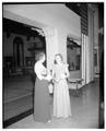 Mollie Strand speaking with a participant in President Strand's reception for all faculty, Memorial Union