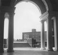 View of Poling Hall through Weatherford Hall Arch