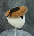 Mushroom style hat of tri-color brown felt with an attached headband of dark brown felt