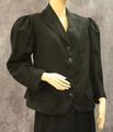 Jacket of black wool with notched collar and button closure down front