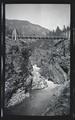 Man on footbridge near Ruby, Washington