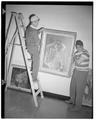 Setting up art exhibit in Memorial Union, July 11, 1950