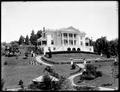 Josselyn house on hill, Portland., with landscaped grounds in foreground.