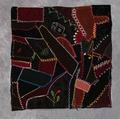 Crazy Quilt of blue, reds and brown velvet with varying stitches