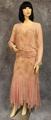 Dress of pink chiffon with bodice and skirt of warm pink and warm brown raised velvet spotted chiffon