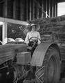 Elsie Hill driving tractor