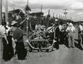 Inspection of experimental hop duster at 1940 Hop Field Day, Corvallis, Oregon