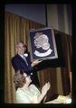 Dan Poling holding Beaver Award at retirement dinner, Oregon State University, Corvallis, Oregon, 1970