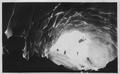 Mountaineers in ice cave, Paradise Glacier, Mt. Rainier