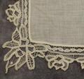 Handkerchief of white cotton batiste with hand-made lace border