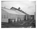 Greenhouse and barn scene from Boys State photo series, Summer 1958