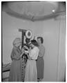 Clothing and textile workshop students working with machinery during summer school, July 1954