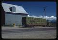 Truck in Linn County loaded with baled alfalfa hay from Boardman, Oregon, 1975