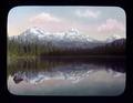 Reflection view of three Sisters across Scott Lake, Cascade N. F.