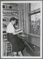 Woman at laboratory bench, circa 1940